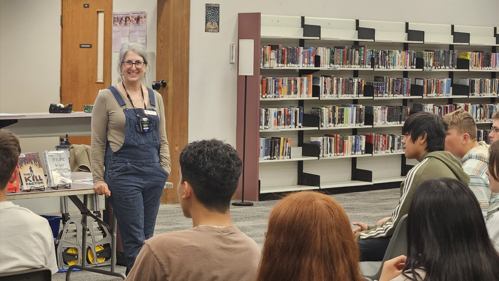 students with librarian Tamar Clarke