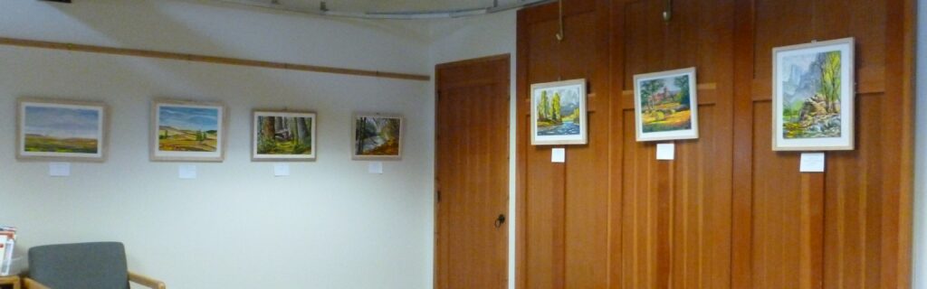 Deming Meeting room with art on the walls